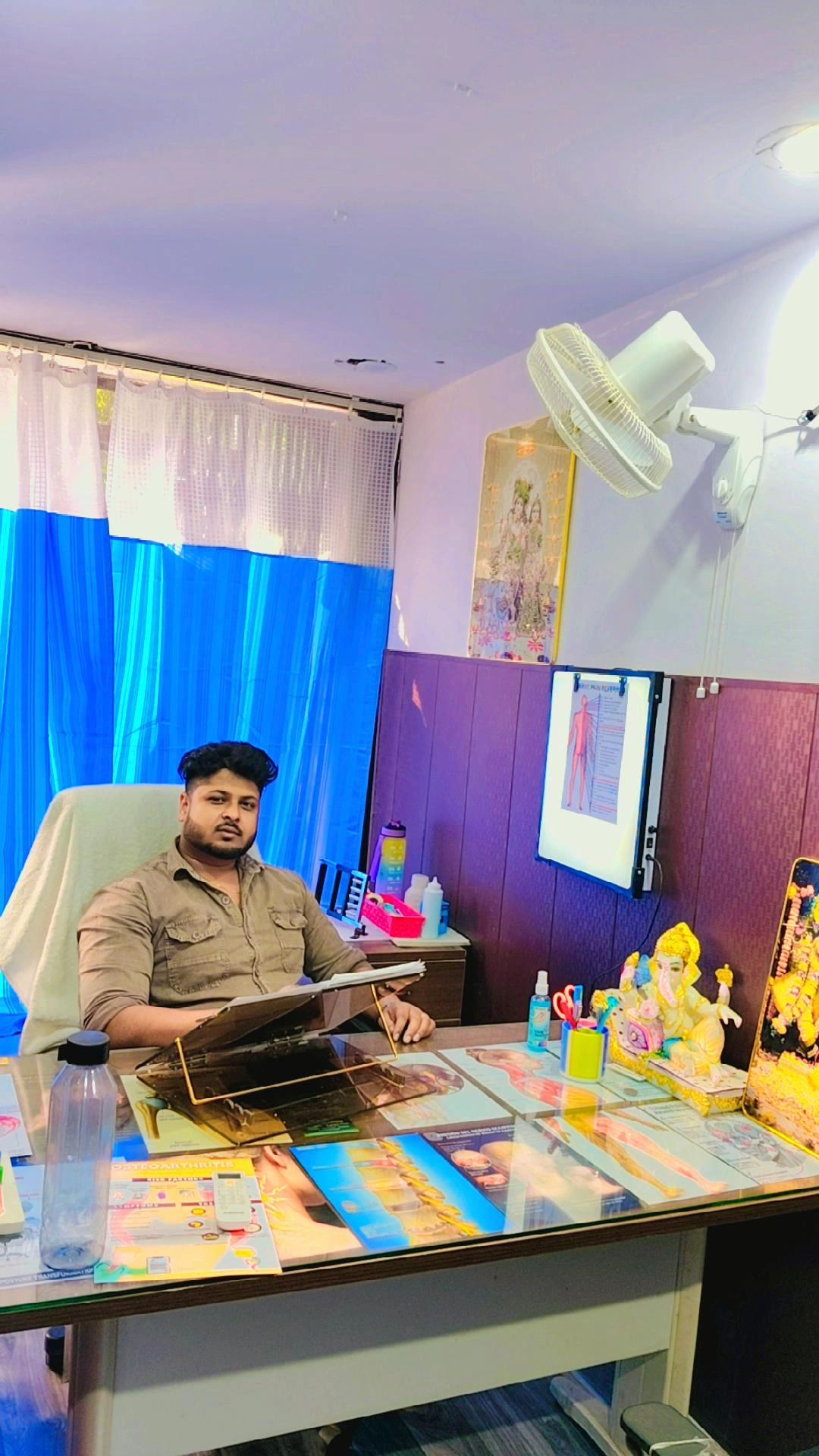 Bablu Maurya seated in the NeoMotion PhysioTherapy clinic