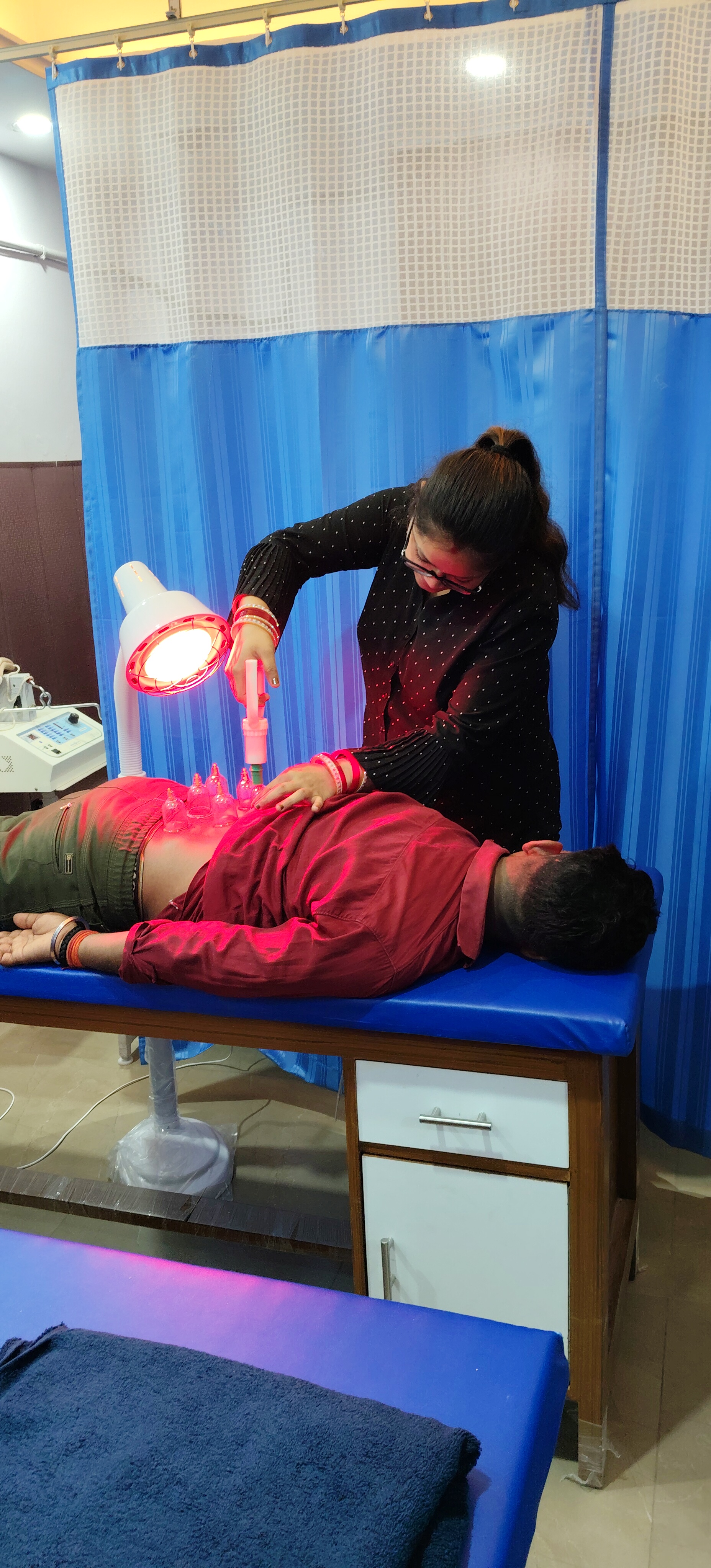 Therapist performing targeted treatment for a patient at NeoMotion PhysioTherapy